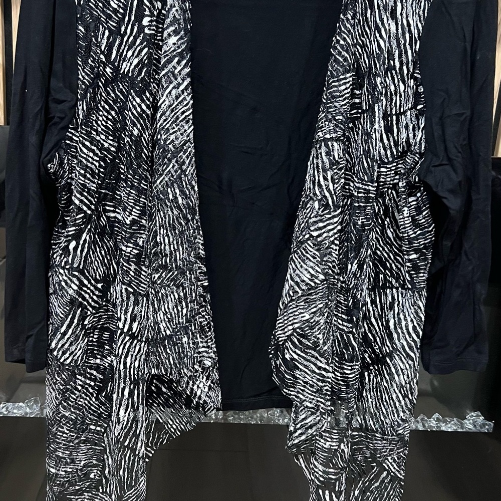 Black and White Patterned Vest with Intricate Design